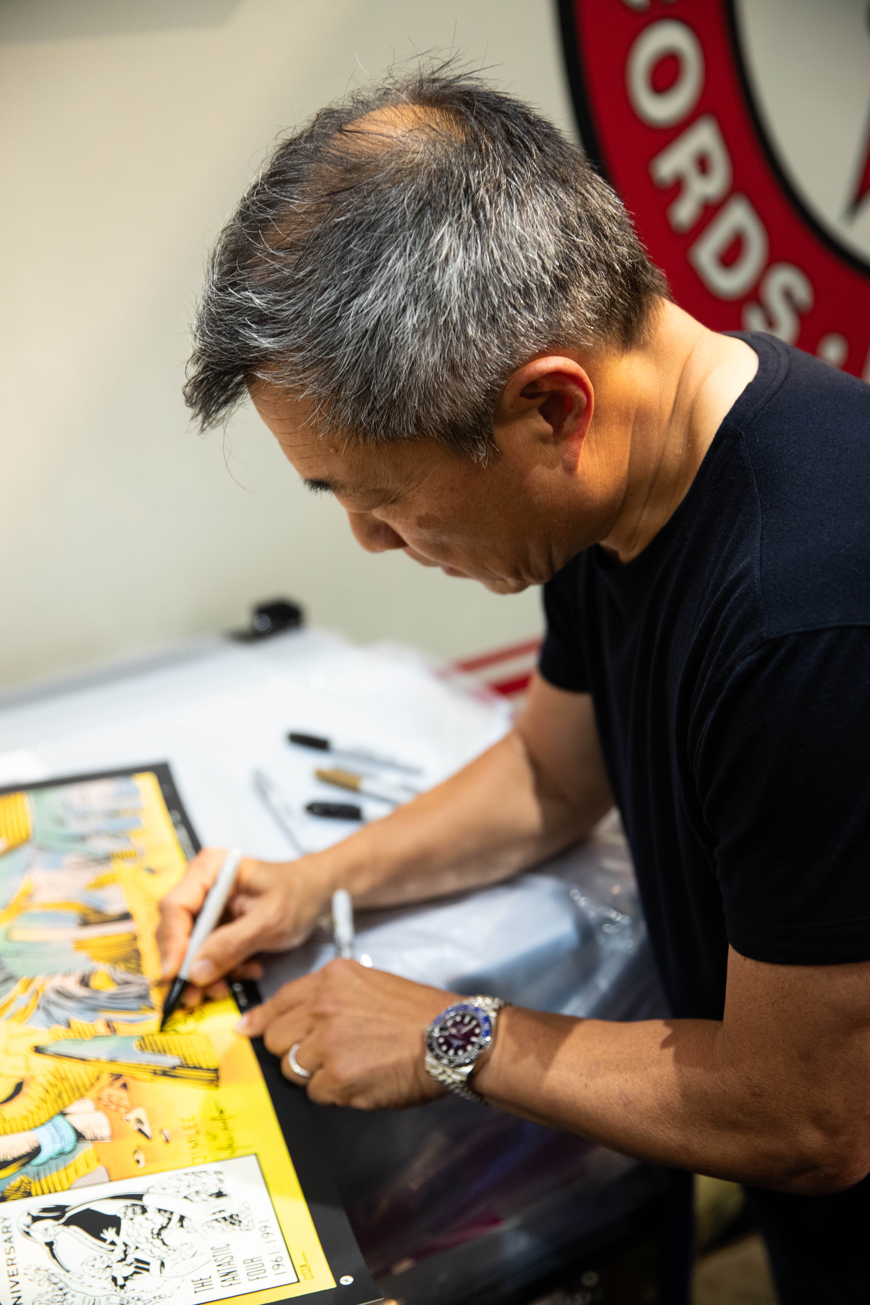 Legendary comic book artist, Jim Lee, stops by Mondo and signs some exclusive posters during SDCC 2023.